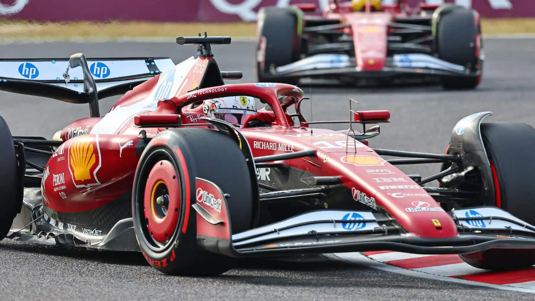 Charles Leclerc and Lewis Hamilton during qualifying for the 2025 Japanese Grand Prix in Suzuka