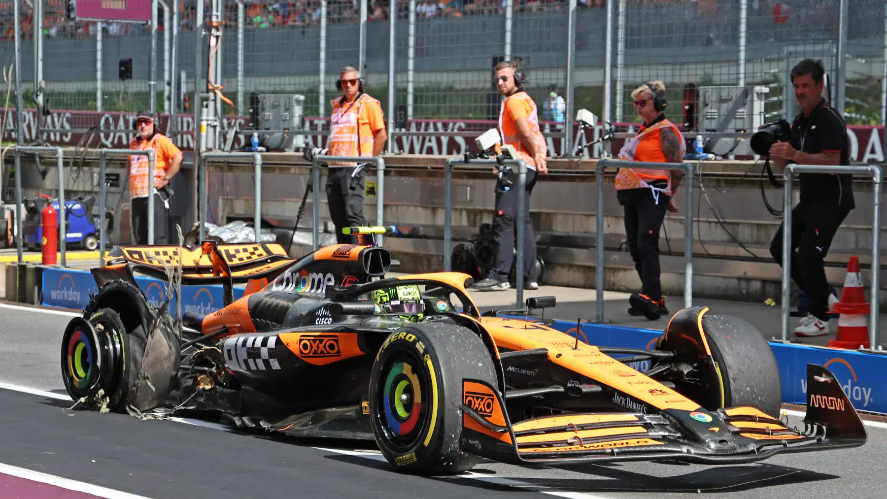 Lando Norris (McLaren-Mercedes) in the pits with a damaged tyre during the 2024 Austrian Grand Prix