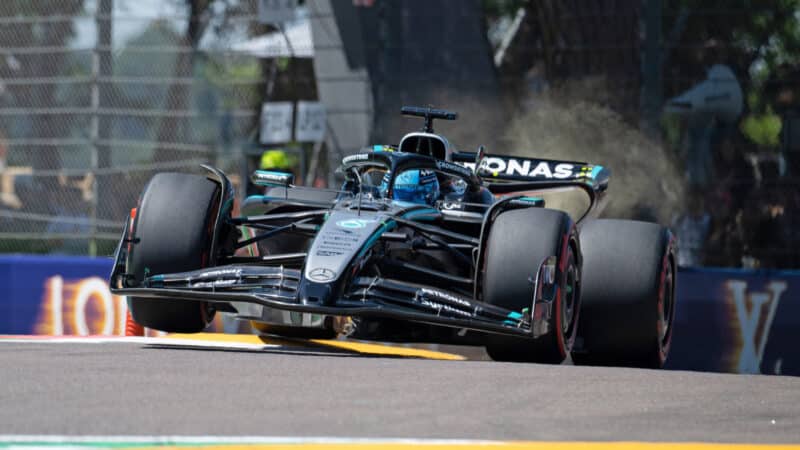 George Russell (Mercedes) with a wheel in the air during practice for the 2025 Emilia Romagna Grand Prix in Imola