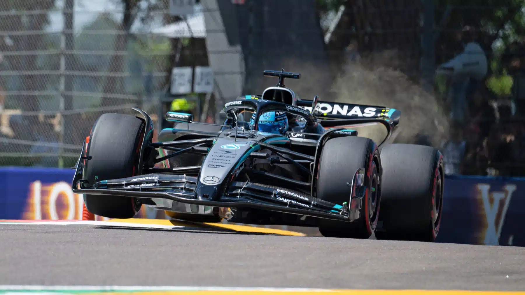 George Russell (Mercedes) with a wheel in the air during practice for the 2025 Emilia Romagna Grand Prix in Imola