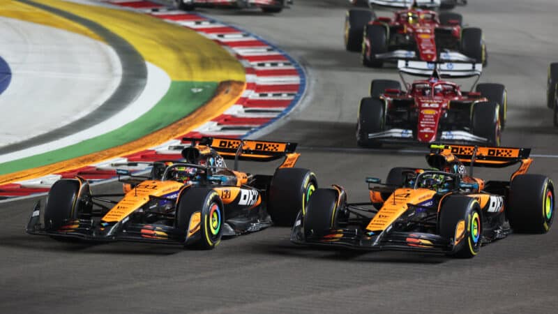 Oscar Piastri and Lando Norris at the start of the Singapore GP