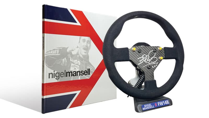 The signature store Nigel Mansell-signed book and full-size fW14B