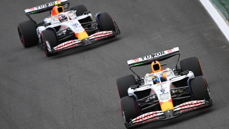 Isack Hadjar ahead of Liam Lawson during the Brazilian Grand Prix