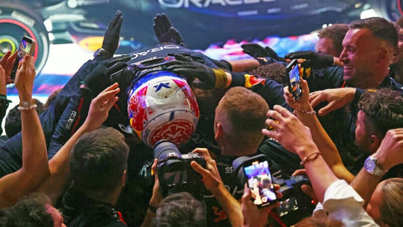 Max Verstappen and Red Bull-Honda mechanics celebrate after the 2025 Qatar Grand Prix