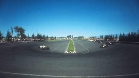 Ginther takes the hairpin at the 1965 Mexican GP