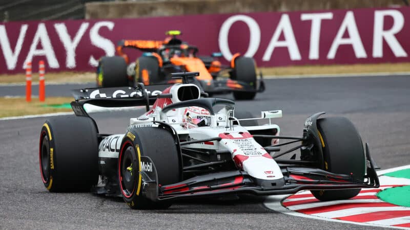 Max Verstappen (Red Bull-Honda) leads Lando Norris (McLaren-Mercedes) during the 2025 Japanese Grand Prix