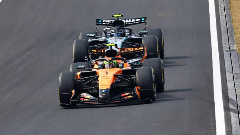 Lando Norris (McLaren-Mercedes) leads Kimi Antonelli (Mercedes) in the 2026 Japanese Grand Prix