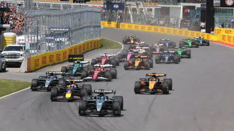 George Russell (Mercedes) leads the field into the first corner after the start of the 2025 Canadian Grand Prix