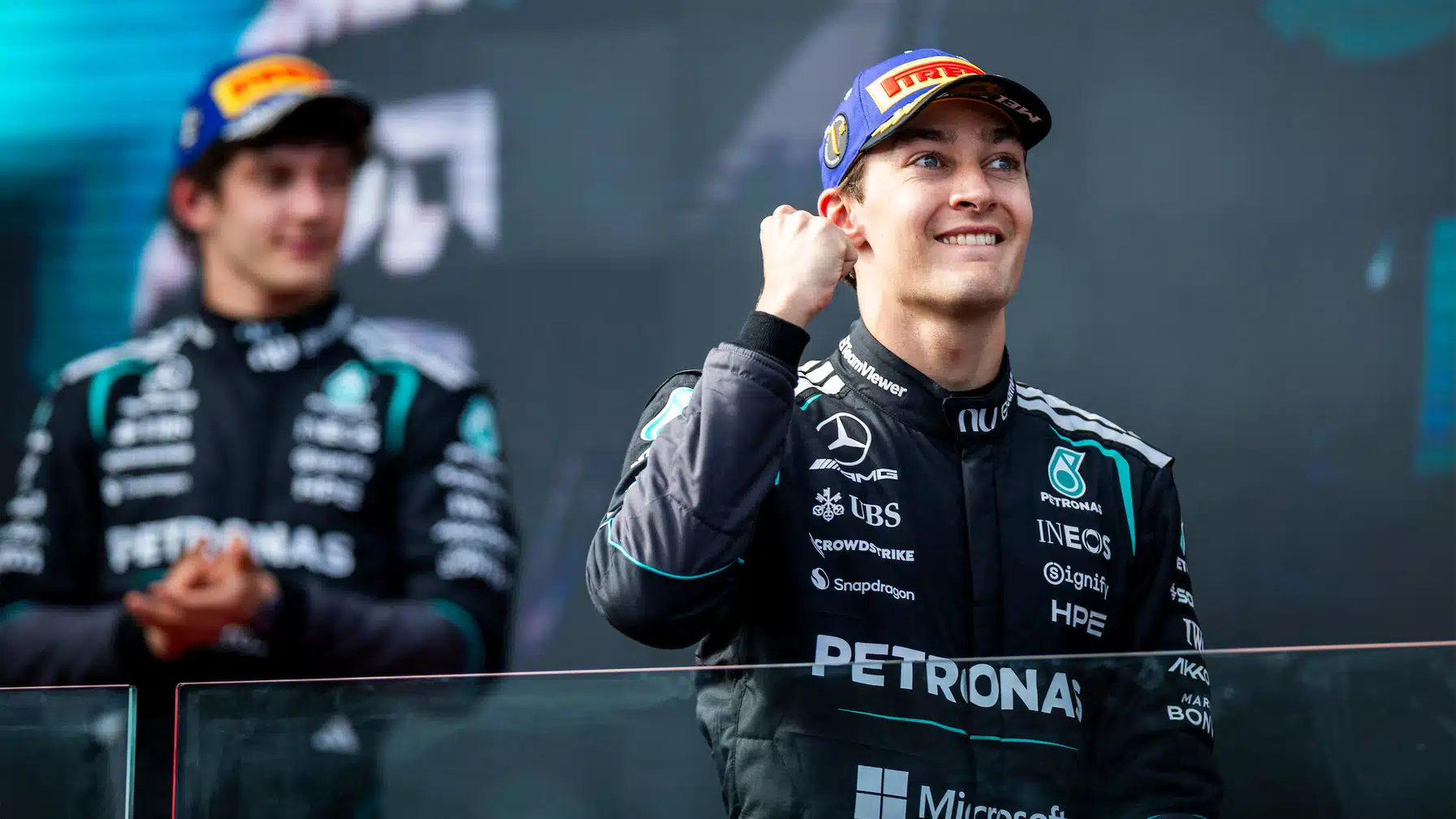 George Russell and Kimi Antonelli (both Mercedes) on the podium after the 2026 Australian Grand Prix