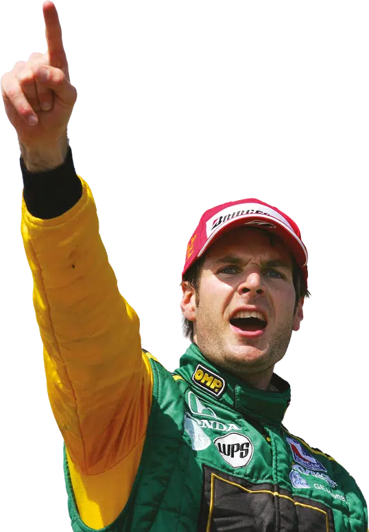 Will Power in green yellow Honda WPS racing suit celebrates with raised finger gesture and red cap