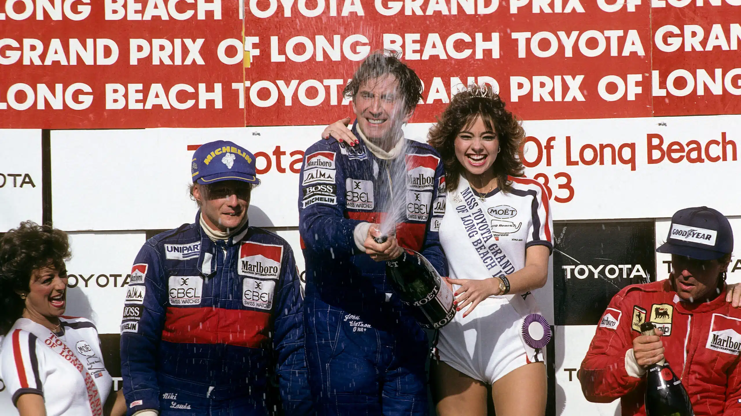 John Watson celebrates victory in the 1983 Long Beach Grand Prix